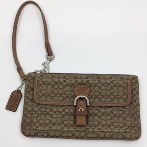Coach Signature Wristlet Coach With silver tone front magnetic snap slip pocket